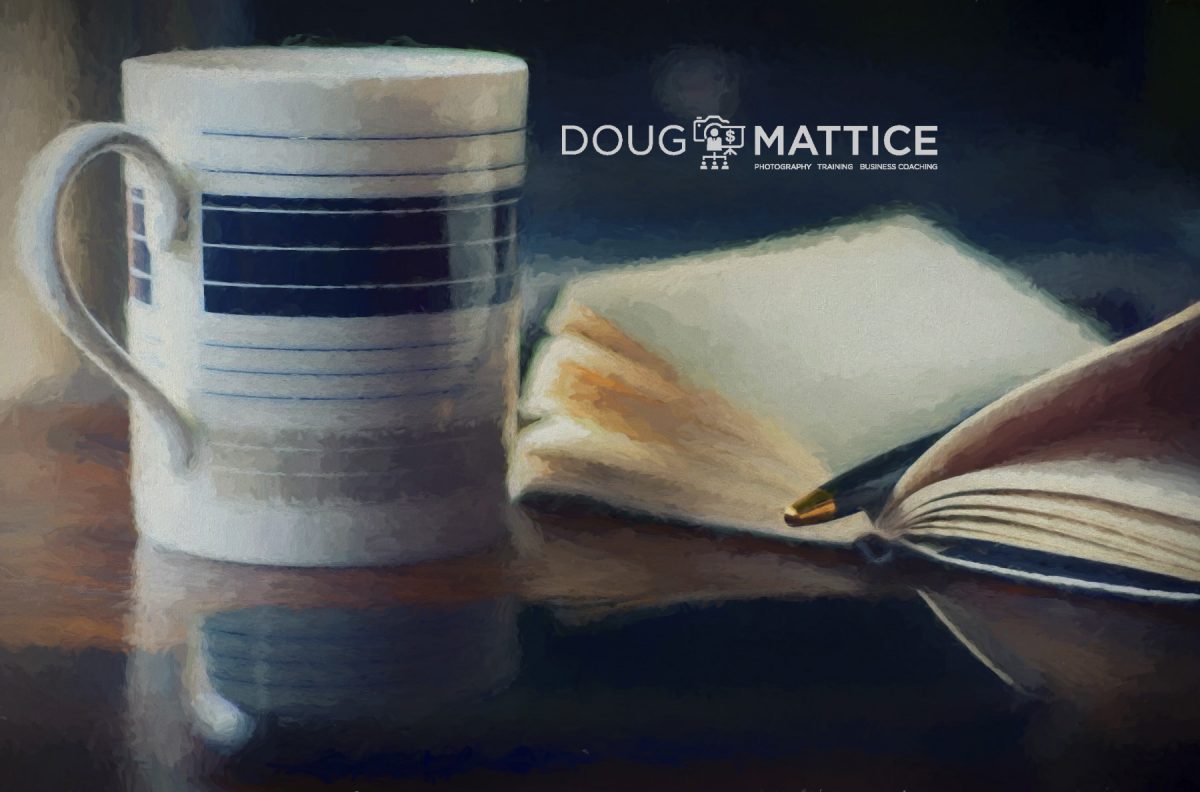 coffee cup and journal for goal setting