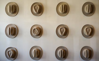Picture of hats depicting all the hats an entrepreneur must wear in their business