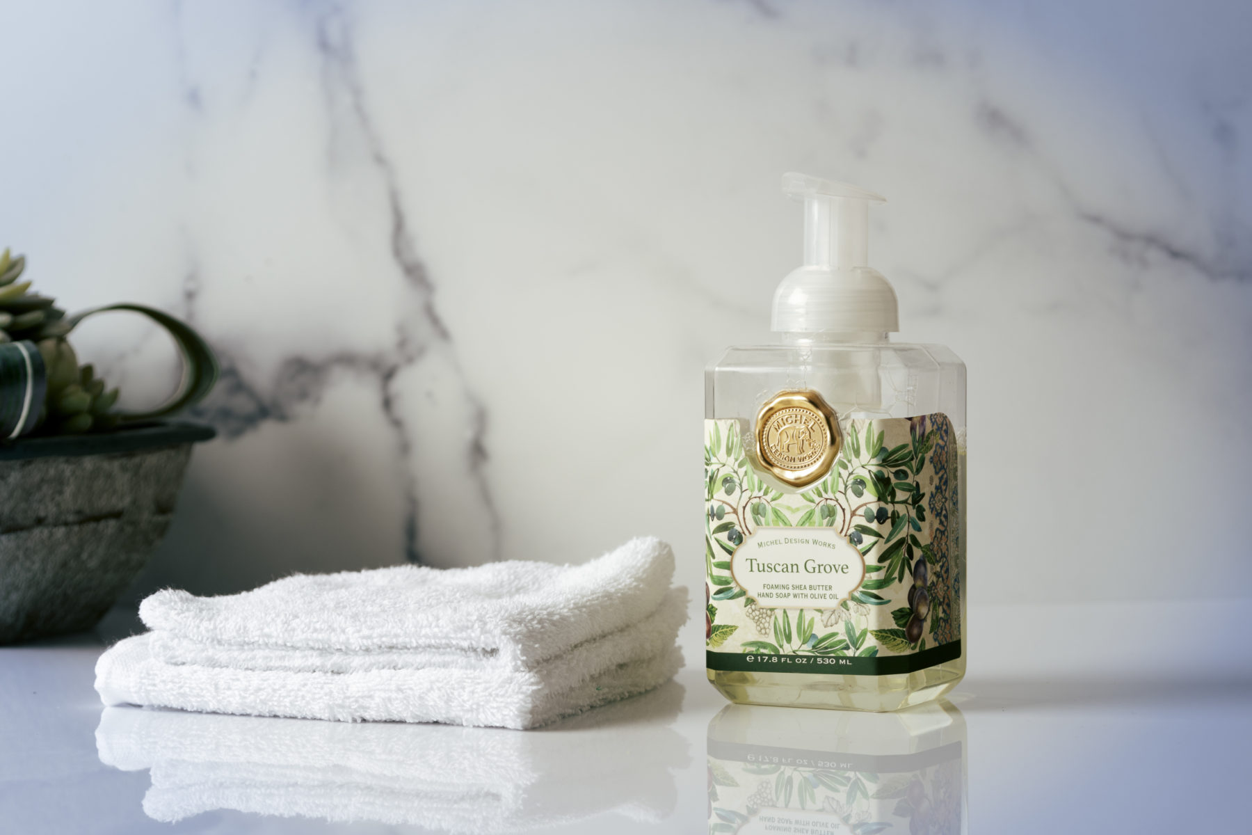 Soap Product-12 Image of soap dispenser and towels