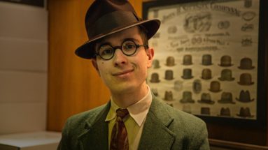 Photograph of a salesman wearing a hat