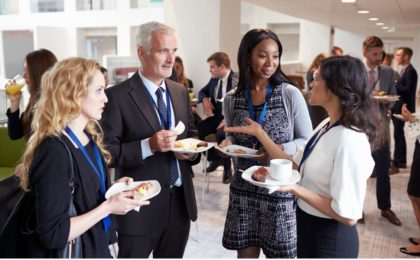 People attending networking event practice the tips to generate qualified leads for their business.