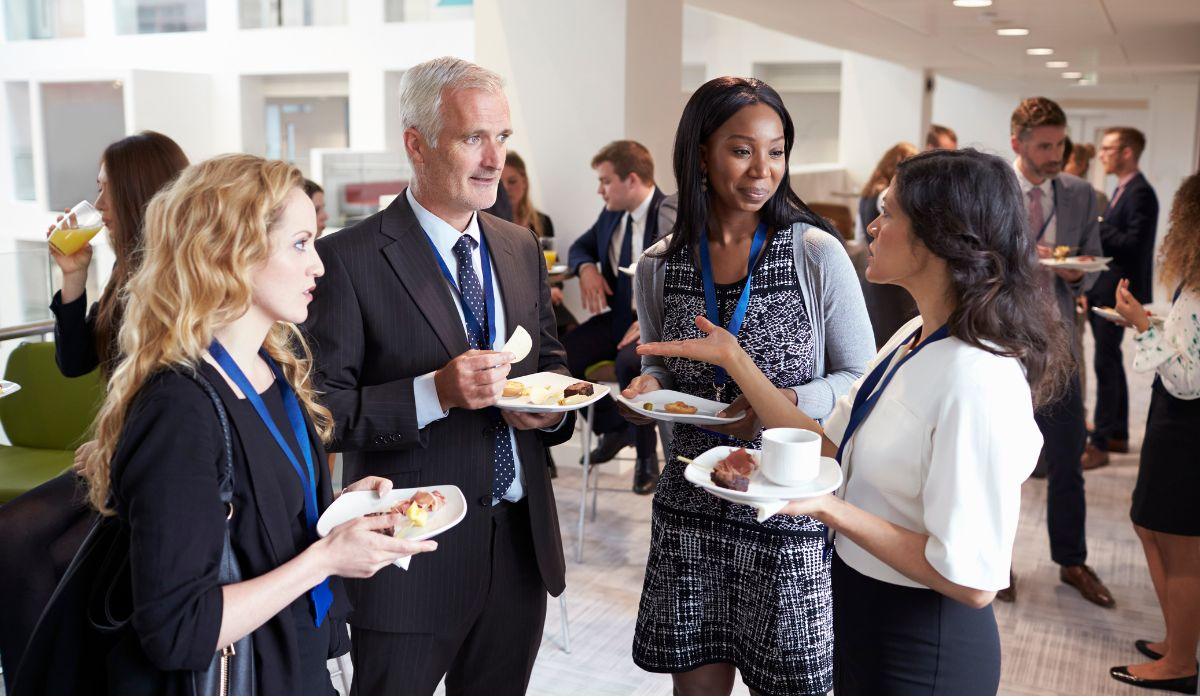 People attending networking event practice the tips to generate qualified leads for their business.