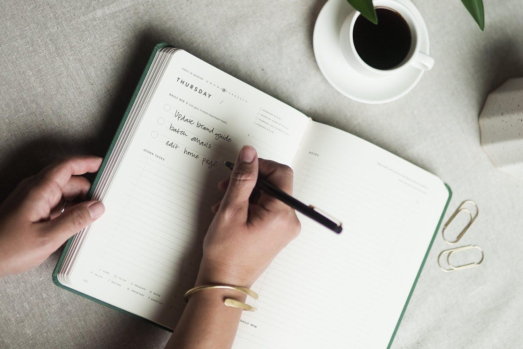 Are "to-do" lists effective? Here is a photo of someone writing their Big 3 in the Full Focus Planner.